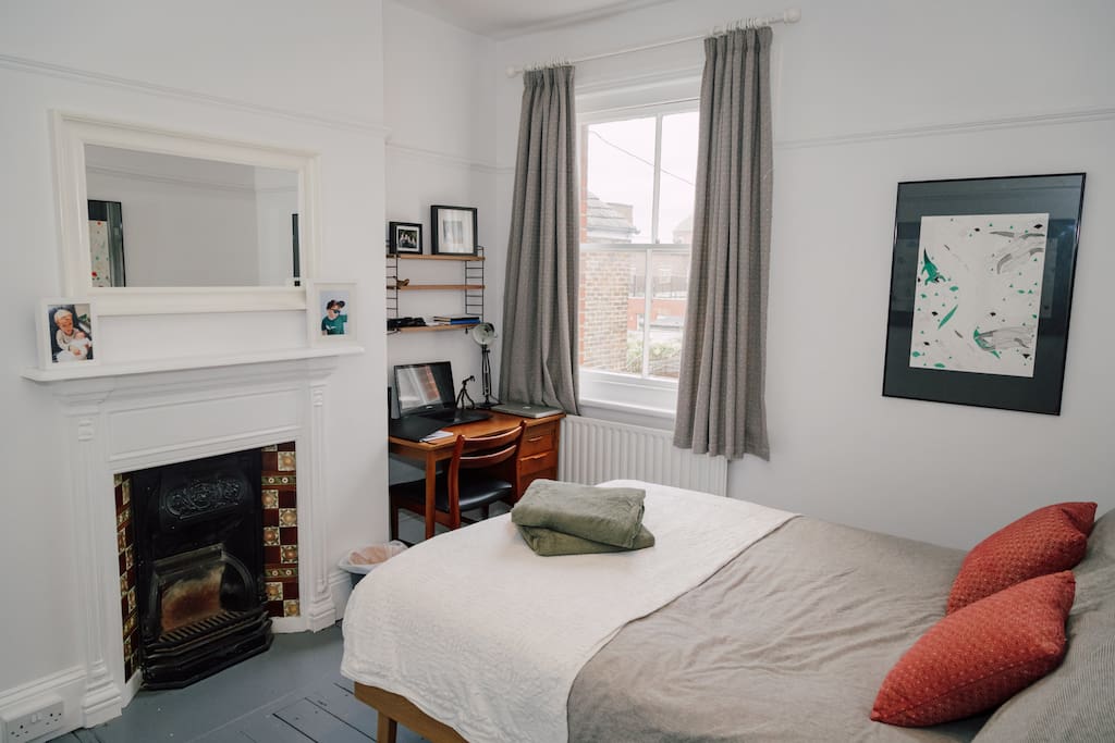 Bedroom 2 has a double bed and desk space