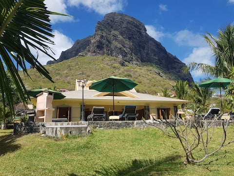 "At the foot of the mountain, Le Morne Brabant"