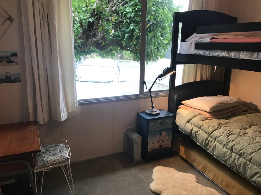 Two single bunk beds with third pull out single bed.