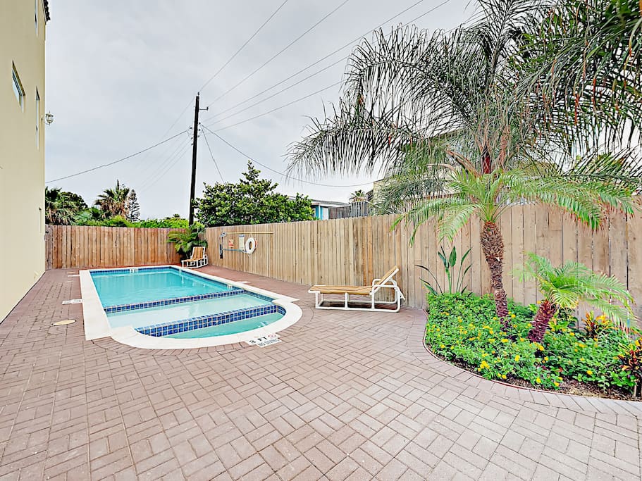 Relax by the pool on the large deck.
