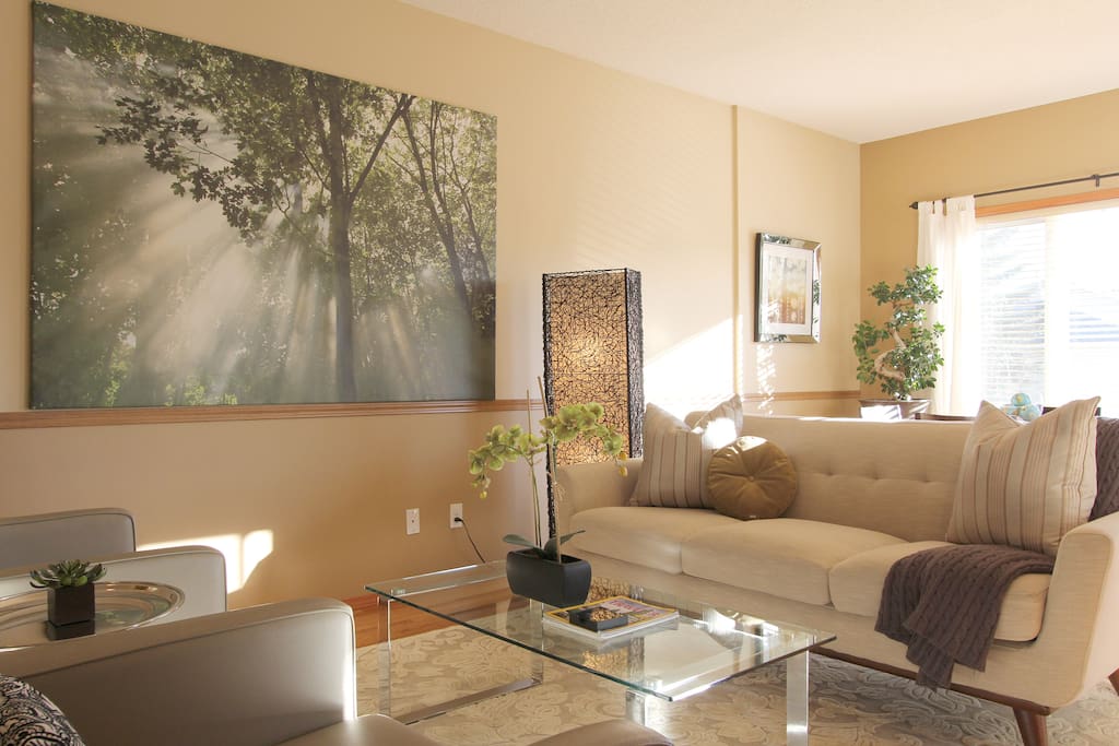 LEVEL 2: Open concept throughout the main level featuring dining room, living room and kitchen with triple sided fireplace!