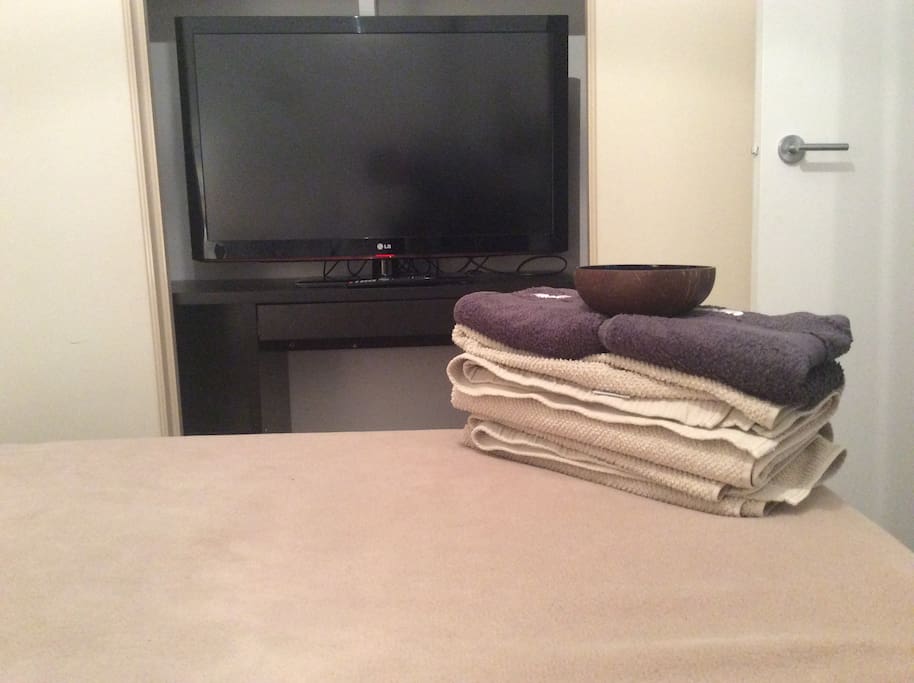 Built in robe includes a TV. Towels are also provided during your stay.