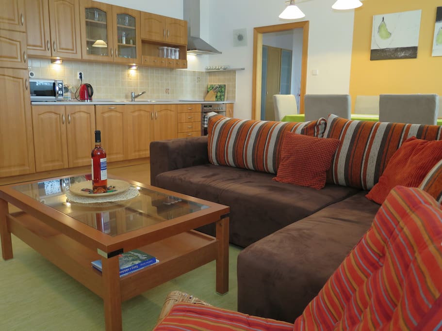 Living area with a view of kitchen