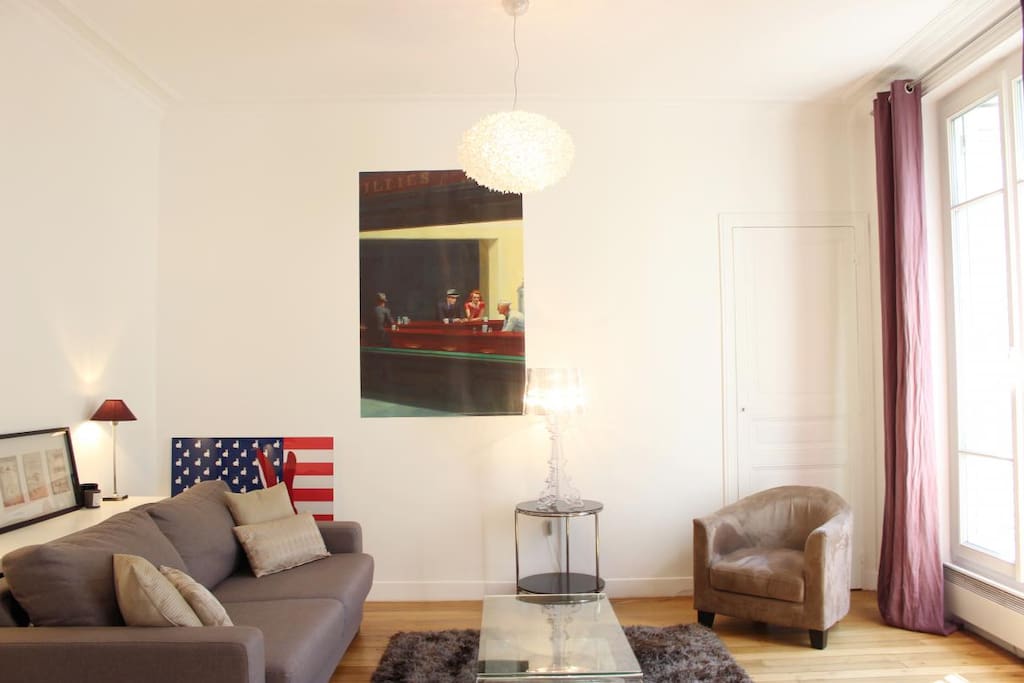 LIVING:The 13 square meters living room has a double glazed window facing street . It is equipped with : double sofa bed, coffee table, TV, 2 armchairs, built-in wall closet, hard wood floor.