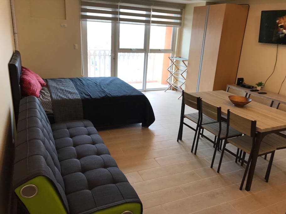 A big double bed and a sofa-bed for a total of 4 persons
