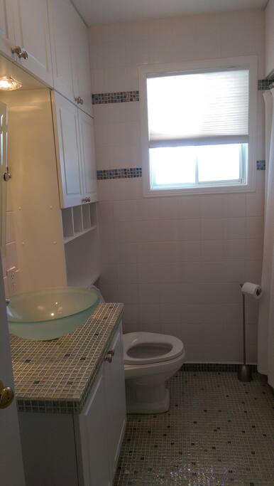 Clean, well-lit bathroom.