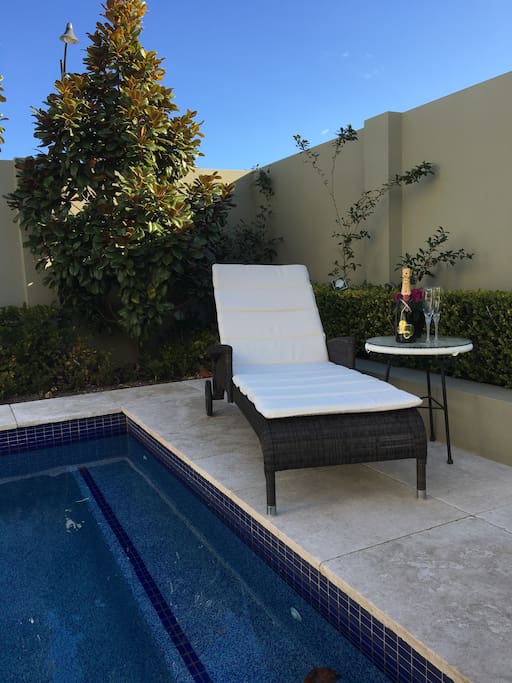 Deck chairs by the pool