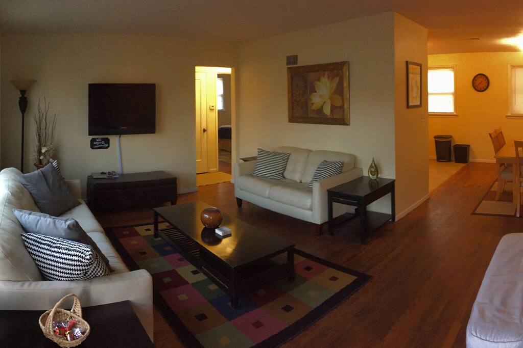 Front door entrance. Living room, dining room and kitchen open floor plan.