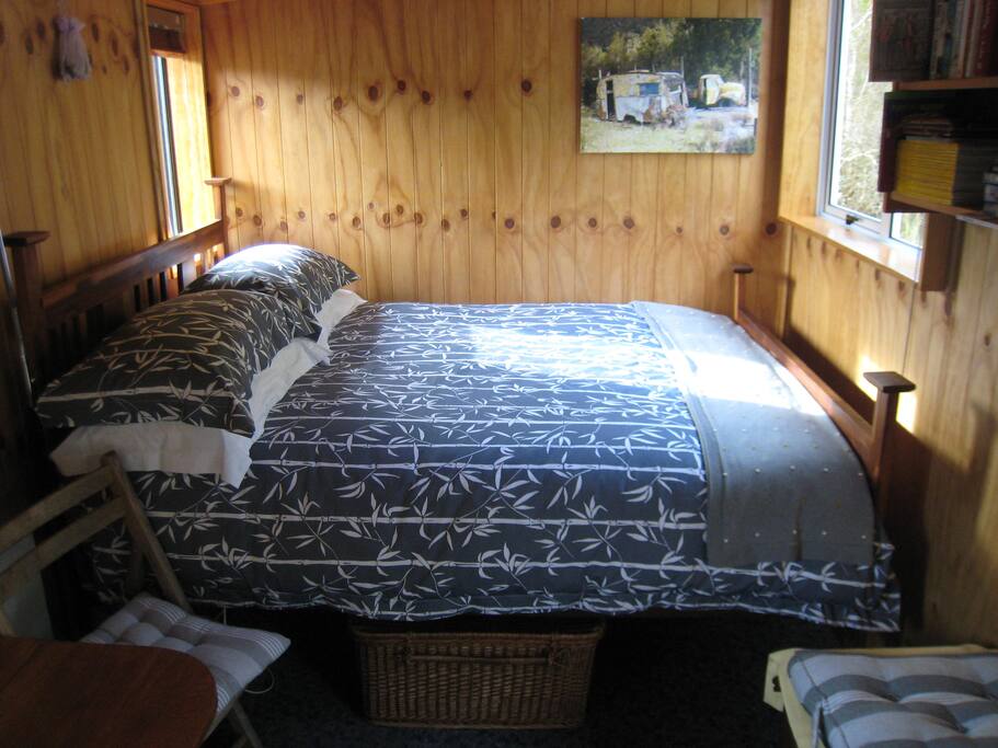 Warm and cosy inside Ruru Hut. Our linen is by Wallace Cotton.