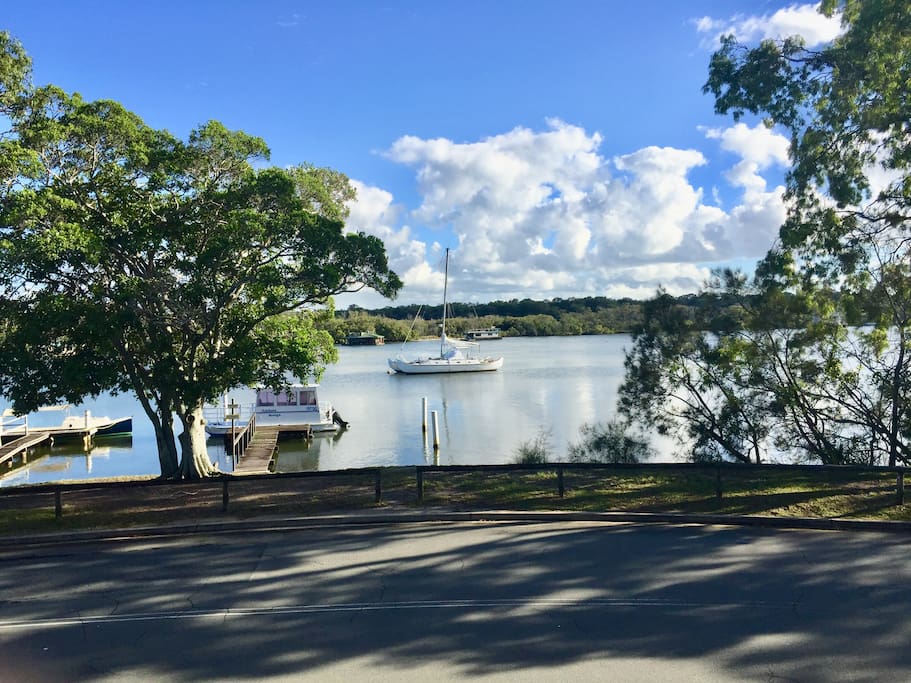 The view directly outside your bedroom window. Beautiful Noosa river and parkland.