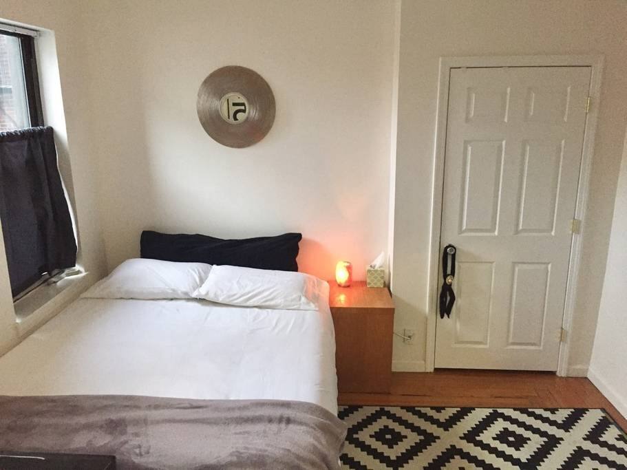 The second bedroom has a queen bed, memory foam, new luxury lines, and vintage art.