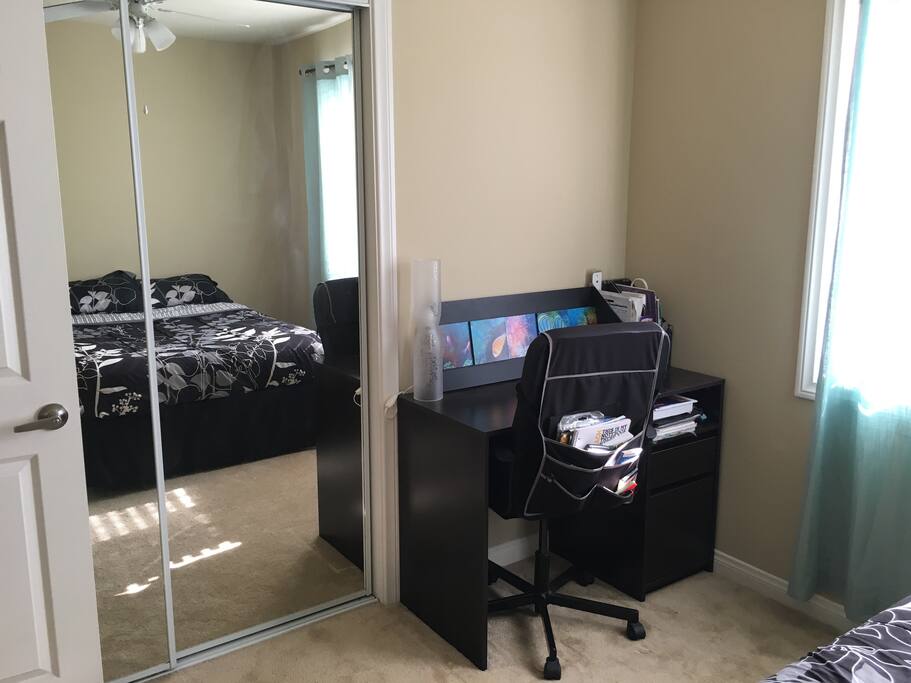 Available closet with hangers and shelves.