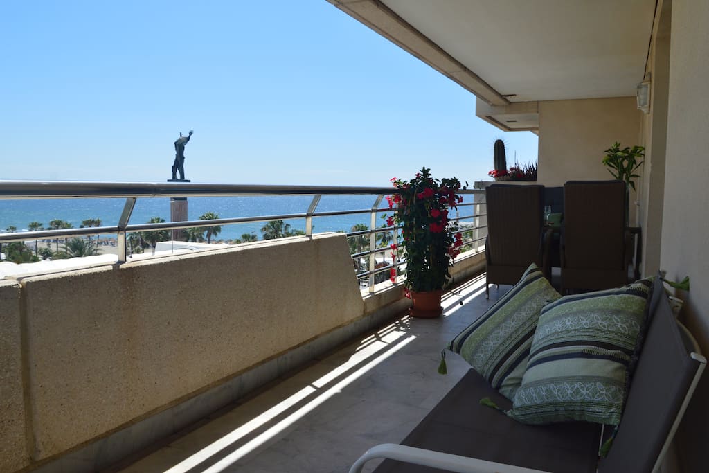 Large terrace with several lounge areas. Seaview.