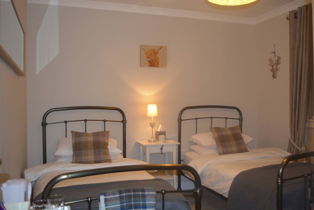 warm cosy bedroom that overlooks the garden and walking park