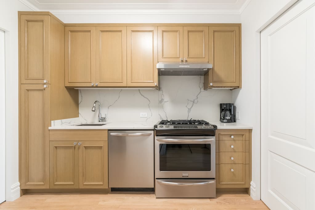 Brand new custom built cabinetry and high end appliances.