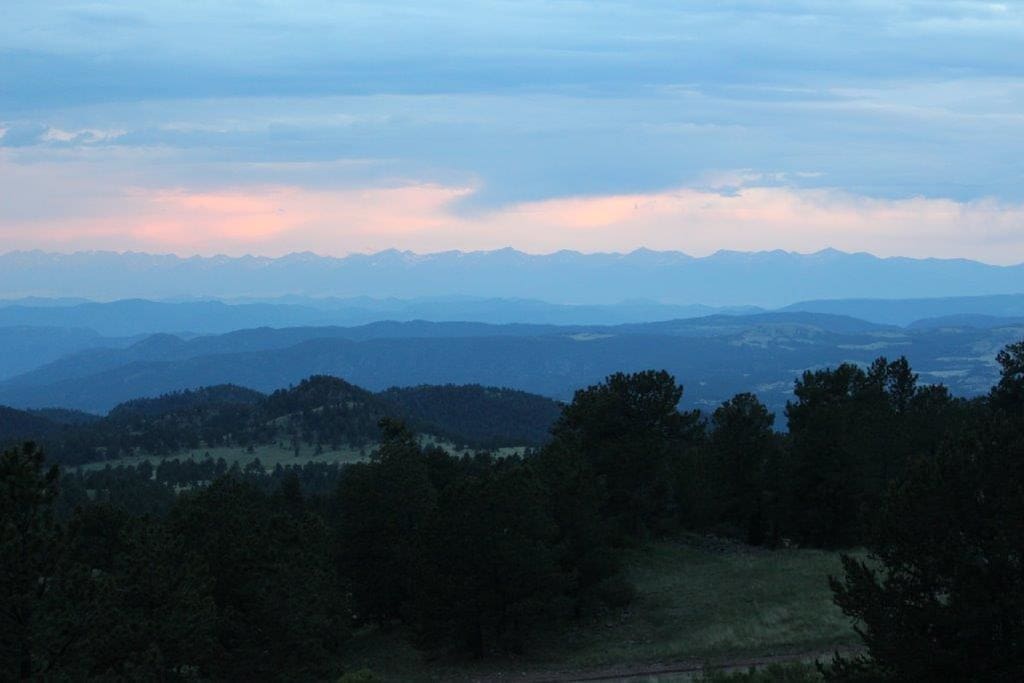 The Sun Rises over Alpine Vista Retreat
