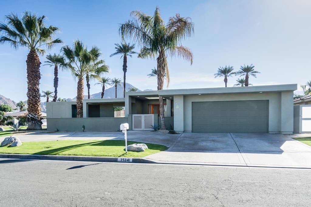 Drive through the quiet and classy Indian Wells neighborhood, adorned with palm trees and desert landscaping