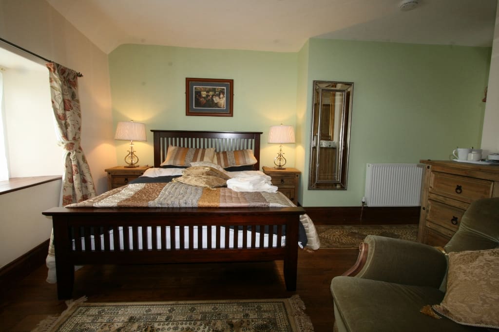 Large double with ensuite power shower, corner bath. Room for 2 fold out beds for children up to 13yrs