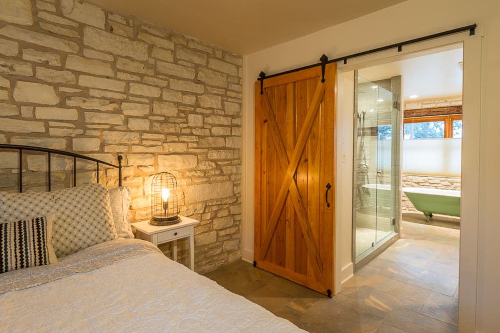 Beautiful barn door leading to master bath