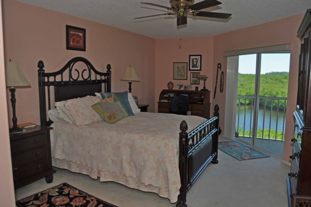 Master Bedroom with a Water View and Lanai Access