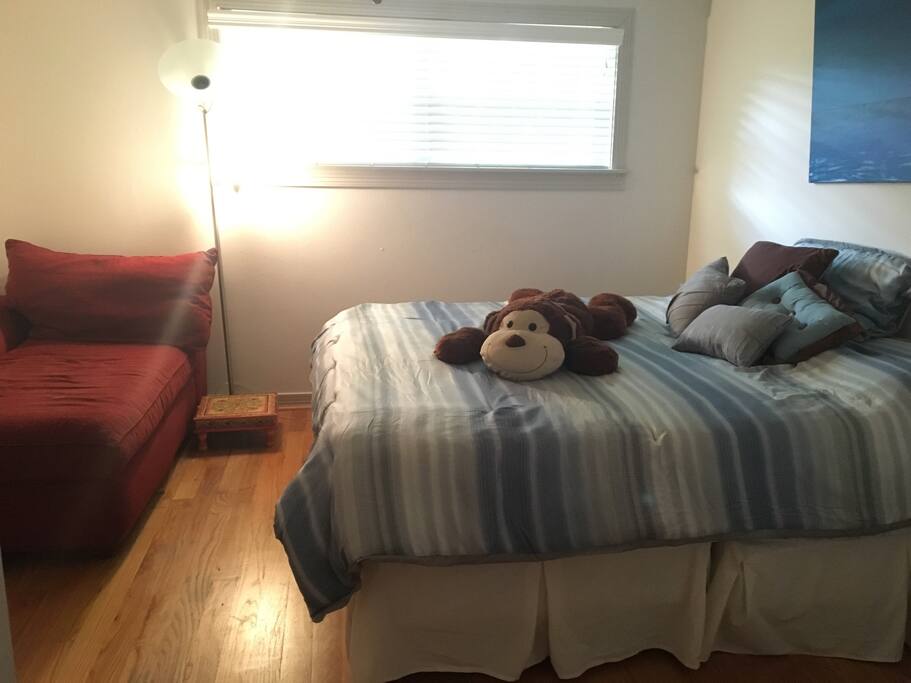 King size bed and chaise for reading.