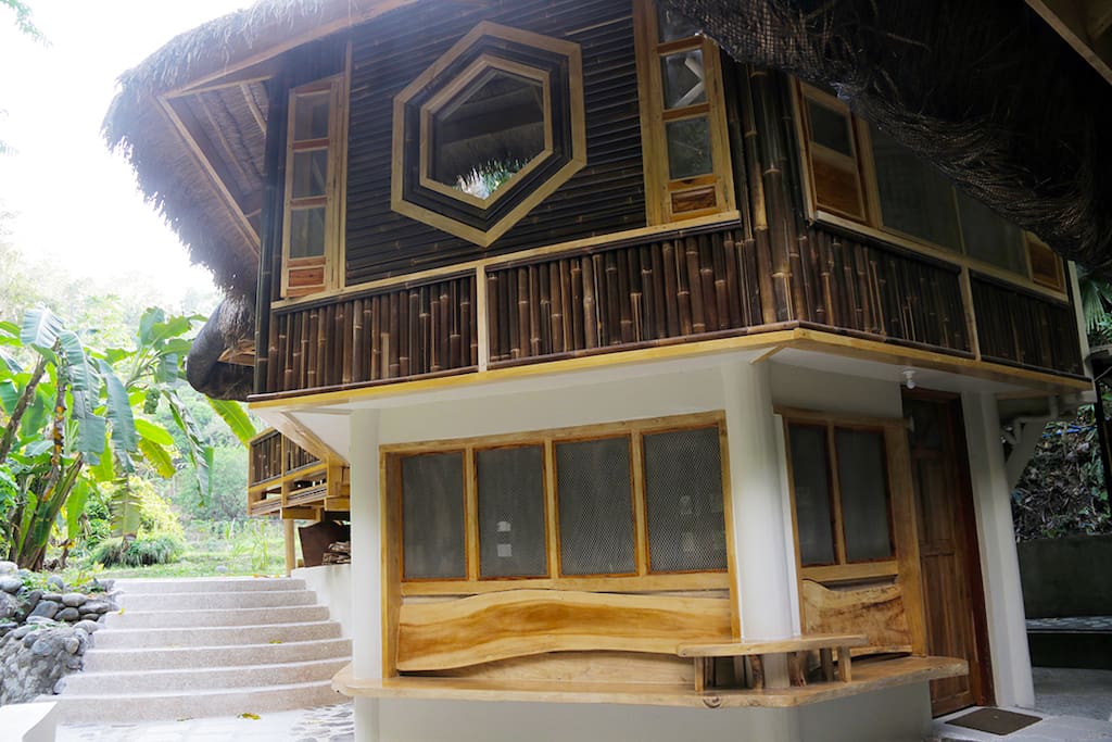 Steps leading to the room downstairs and outdoor kitchen/dining
