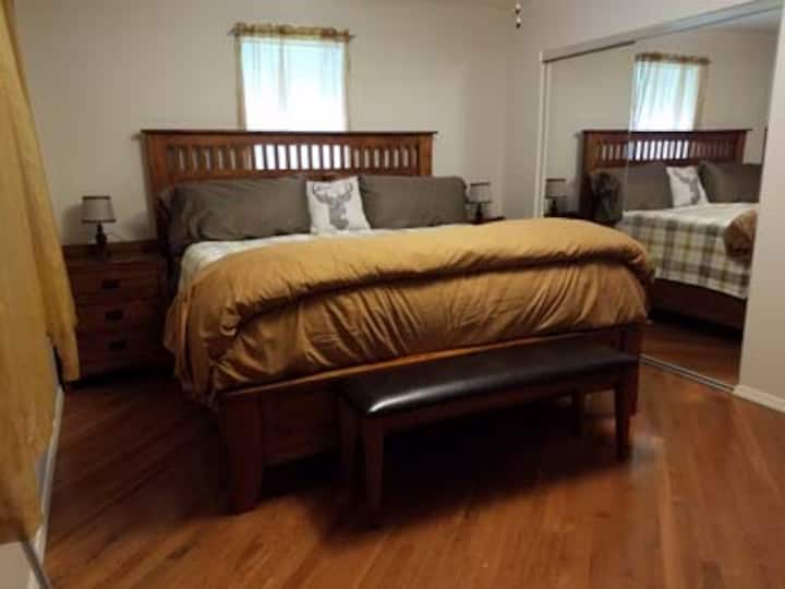 Downstairs bedroom with King size bed
