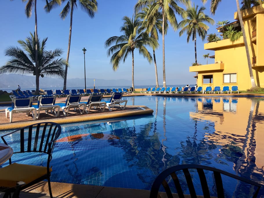 Main pool by condo with cafe and bar There are seven pools on the property.
