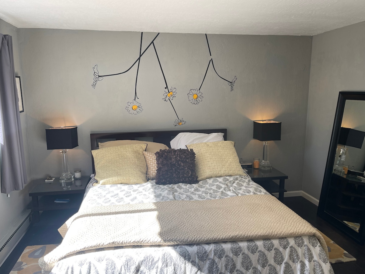 Master bedroom with Cal King bed, TV with cable and streaming. 