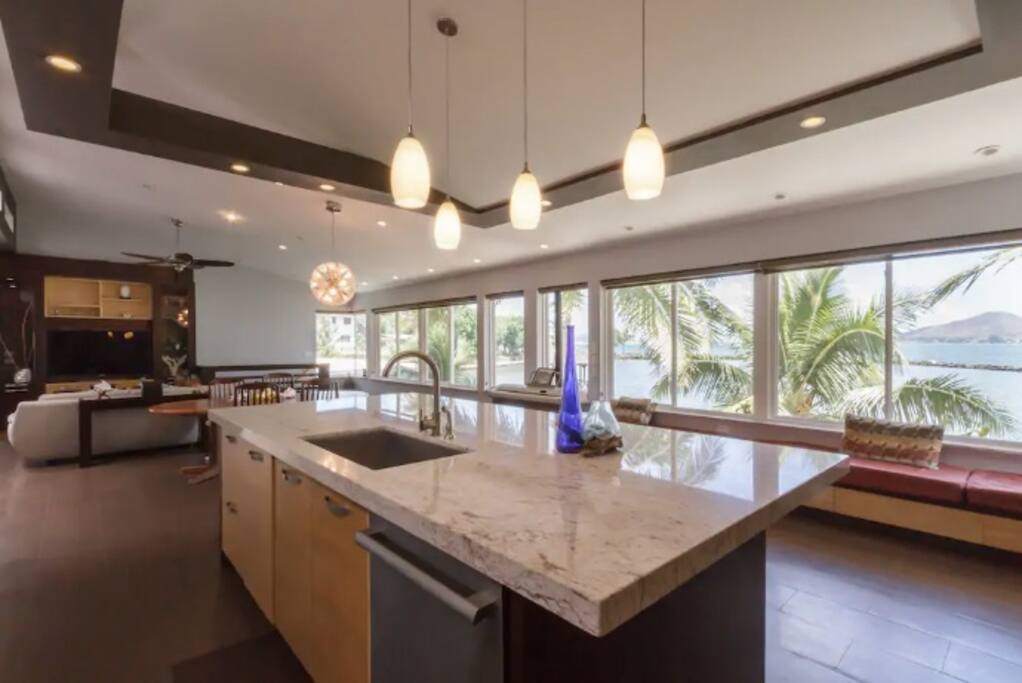 Prepare meals at the kitchen while enjoying the picturesque view.