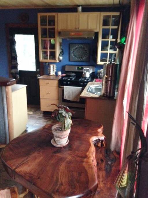 Fully-equipped kitchen with gas range and Berkey water filter.