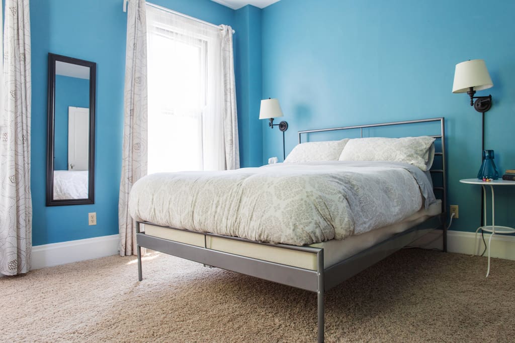 Soft bedding, reading lights, ceiling fan, draperies to control the amount of light in the room