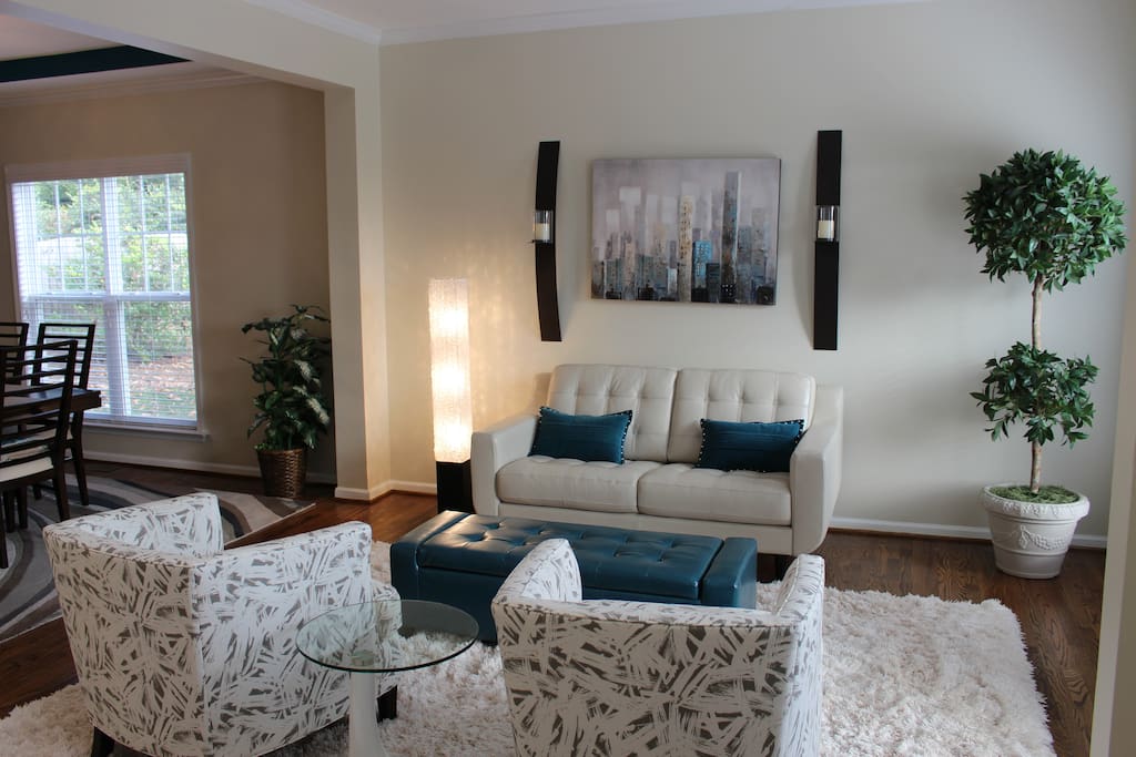 Cozy living room overlooks the front yard.
