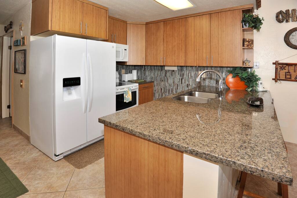 New kitchen granite, bamboo cabinets, sink, appliances..