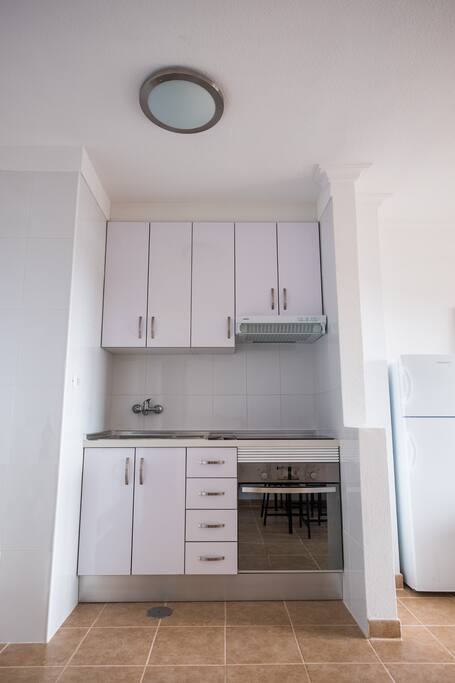 Cocina con horno y vitrocerámica