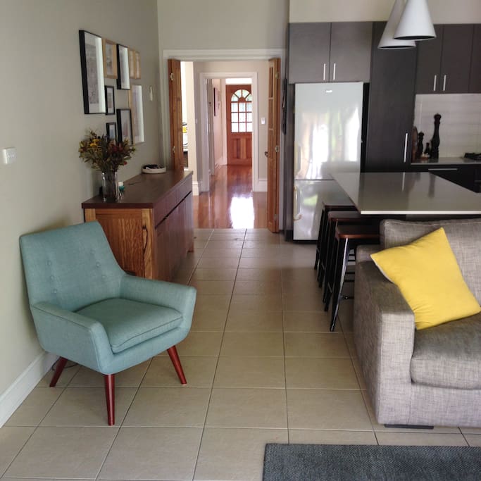 Living area looking toward kitchen, dining room and bedrooms