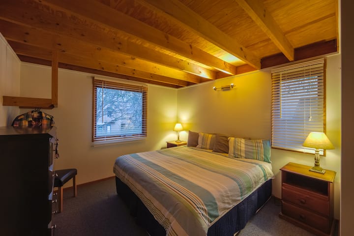 Master bedroom with king bed which can be split into two singles upon request
