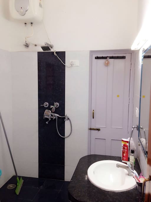 Fully equipped and clean bathroom with shower and geyser