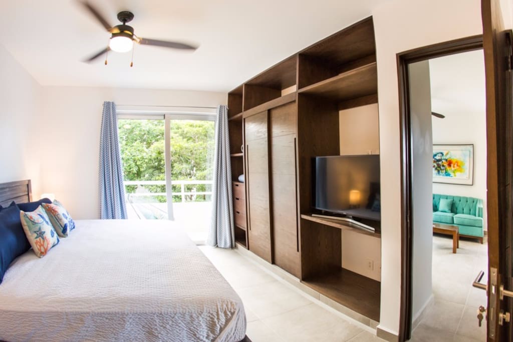 Master bedroom with access to the balcony