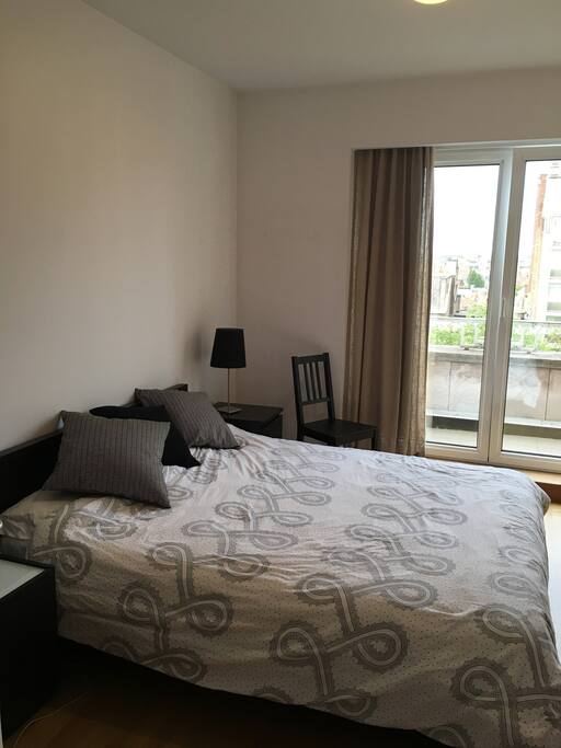 Master bedroom with balcony