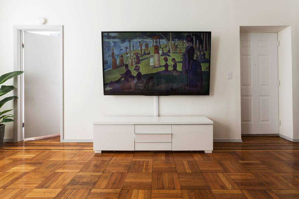 Gather everyone around for a Home Theater Experience! 80 inch interactive Sharp smart TV with Netflix, Roku, Amazon Prime, Apple TV and premium cable access.
