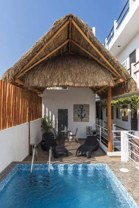 Public outdoor pool for building guests
