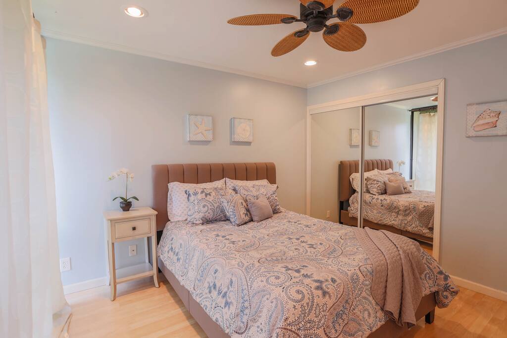 Queen bed in bedroom 1.