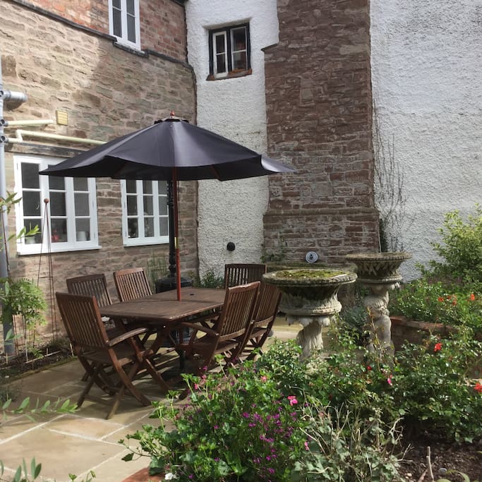 Lovely outside courtyard with patio heater.