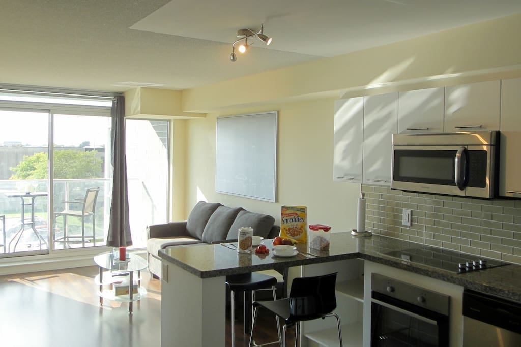 Spacious living room with walk out to the balcony