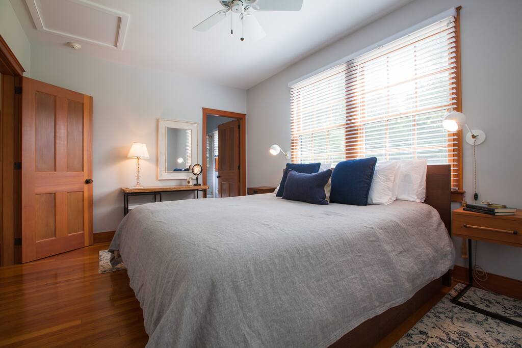 The Carriage House sleeps four with a king-sized bed in the master bedroom, a queen-sized sleeper sofa in the living room, and one-and-a-half bathrooms.