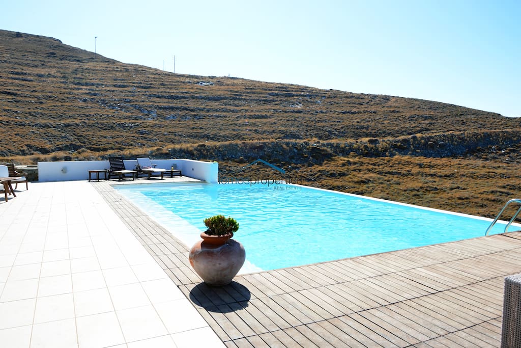 The pool with a large sunbathing area