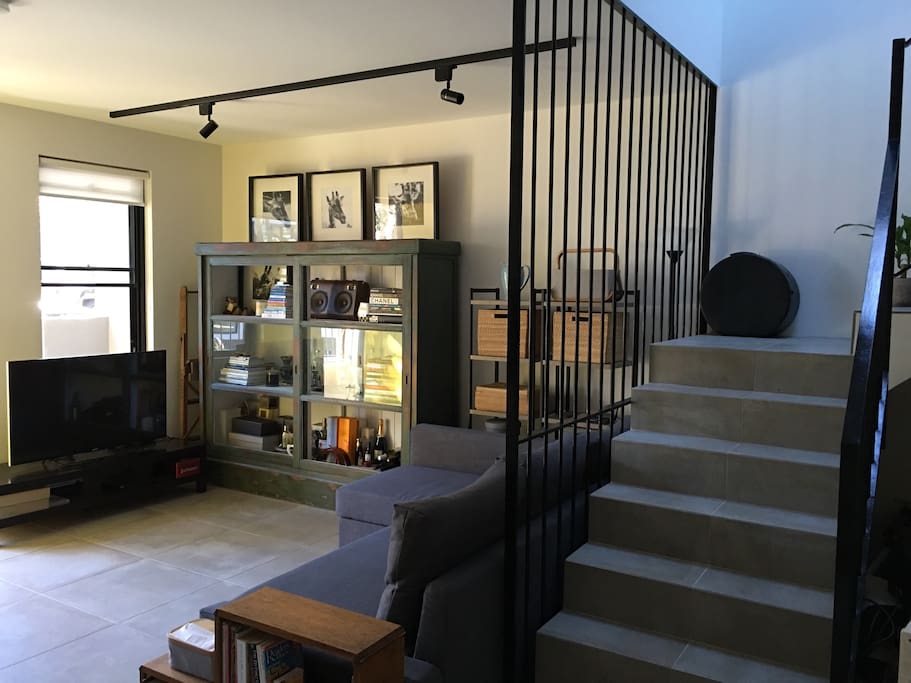 Living area is a light and bright space. Corner couch easily extends into a full size comfortable day bed. Perfect for relaxing with a book or enjoying Netflix. Sony 4K Smart TV.