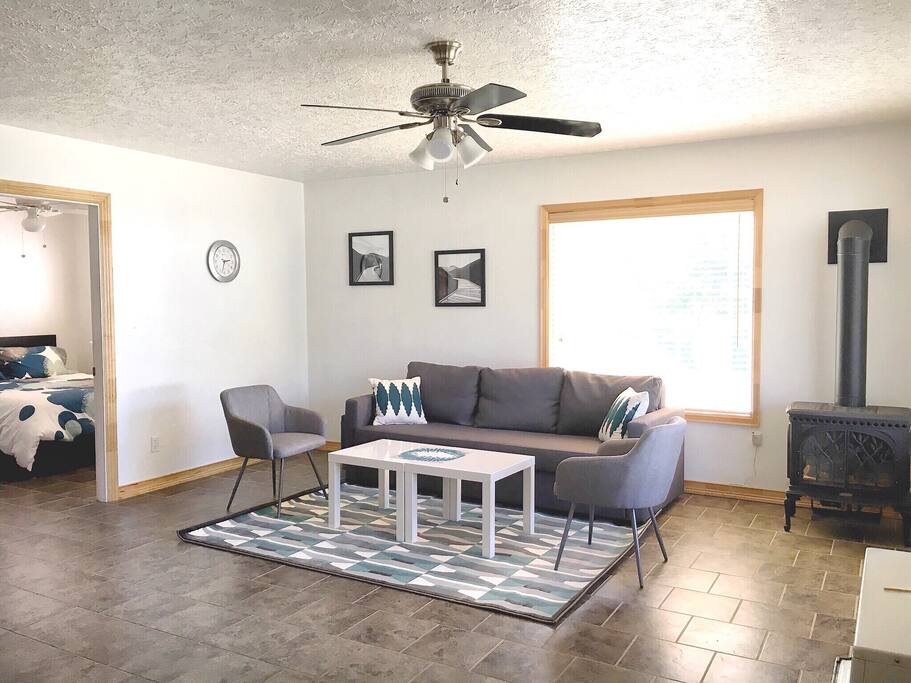 Living room with view of smaller bedroom