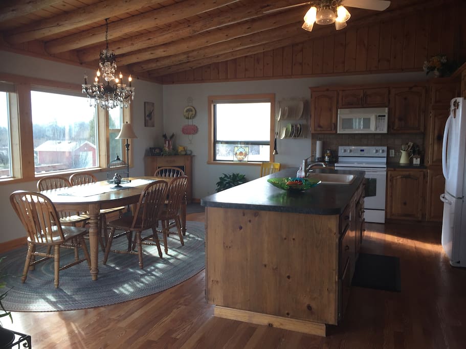 Spacious kitchen/dining room, with scenic views of the area.